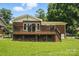 Backyard with stairs that lead up to the deck at 5126 Unaka Ave, Charlotte, NC 28205