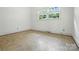 Bright bedroom with tiled flooring and natural light at 5126 Unaka Ave, Charlotte, NC 28205
