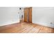 Bedroom with hardwood floors and neutral paint at 5126 Unaka Ave, Charlotte, NC 28205