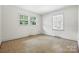 Light-filled bedroom with tiled flooring at 5126 Unaka Ave, Charlotte, NC 28205