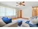 Inviting living room with hardwood floors, comfortable sofas, and large windows for plenty of natural light at 5126 Unaka Ave, Charlotte, NC 28205