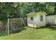 Backyard swing set and storage shed at 5126 Unaka Ave, Charlotte, NC 28205