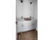 Bathroom with dual vanities and modern lighting fixtures at 638 Amberjack Pl # 76, York, SC 29745