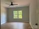 Bedroom with a window and hardwood floors and ceiling fan at 908 30Th Avenue Nw Dr # 2, Hickory, NC 28601