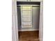 Bedroom closet with built-in shelving and modern doors at 908 30Th Avenue Nw Dr # 2, Hickory, NC 28601