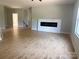 A spacious living room featuring wood floors and a contemporary fireplace, perfect for relaxing and entertaining at 908 30Th Avenue Nw Dr # 2, Hickory, NC 28601