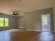 Open living area showcasing wood floors, modern ceiling fan and neutral walls at 908 30Th Avenue Nw Dr # 2, Hickory, NC 28601