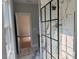 Modern tiled shower with black framed glass and a rain shower head at 908 30Th Avenue Nw Dr # 2, Hickory, NC 28601