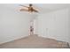 Cozy bedroom with connecting hall and closet offers a comfortable living space at 10303 Dominion Village Dr, Charlotte, NC 28269