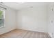 Neutral bedroom with carpet and window with coverings for natural light at 10303 Dominion Village Dr, Charlotte, NC 28269
