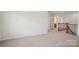 An open, adaptable loft space with access to the rest of the house at 10303 Dominion Village Dr, Charlotte, NC 28269