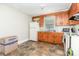 Functional kitchen offers ample cabinet space and vintage appliances, ready for your personal touch at 1033 Rollingwood Dr, Charlotte, NC 28217