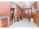 Enclosed sunroom with brick accents and tile floors, offering a versatile space for relaxation or hobbies at 1033 Rollingwood Dr, Charlotte, NC 28217