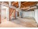 Unfinished basement with visible ceiling beams, ductwork, and open stud walls at 1048 Shenandoah Dr, Gastonia, NC 28052