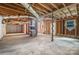 Unfinished basement with visible ceiling beams, ductwork, and open stud walls at 1048 Shenandoah Dr, Gastonia, NC 28052