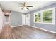 Bright living room featuring fresh paint, hardwood floors, and abundant natural light at 1048 Shenandoah Dr, Gastonia, NC 28052