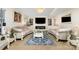 Elegant living room with matching sofas, a modern fireplace, and stylish decor at 12822 Plumleaf Dr, Charlotte, NC 28213