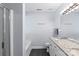 Bright bathroom with double granite vanity, shower, separate tub, black tile floor and a large, well lit mirror at 13517 Silver King Ct, Huntersville, NC 28078