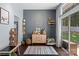 Cozy playroom with decorative wall art, storage, and natural light from sliding glass doors at 13517 Silver King Ct, Huntersville, NC 28078