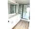 Modern bathroom boasts dual sinks, quartz countertop, walk-in shower with stylish tile, and modern fixtures at 1683 Interstate View Dr, Gastonia, NC 28052
