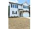 Charming two-story home with a white exterior, black shutters, a covered front porch, and an attached garage at 1683 Interstate View Dr, Gastonia, NC 28052