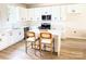 Bright kitchen featuring white cabinets, stainless steel appliances, quartz countertops, and a stylish island with seating at 1683 Interstate View Dr, Gastonia, NC 28052