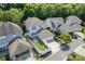 Aerial view of a backyard with houses, a privacy fence and a patio at 17514 Harbor Walk Dr, Cornelius, NC 28031