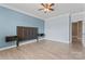 Primary bedroom boasts hardwood floors, accent wall, ceiling fan, and lots of room at 17514 Harbor Walk Dr, Cornelius, NC 28031