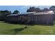 Brick home with solar panels and a wooden deck at 3080 Shue Rd, Salisbury, NC 28147