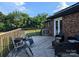 Outdoor deck featuring patio furniture and lounge chairs, ideal for relaxing and enjoying the serene backyard at 3080 Shue Rd, Salisbury, NC 28147