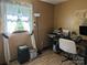 This office features lots of natural light, wood laminate floors, and a computer workstation at 3080 Shue Rd, Salisbury, NC 28147