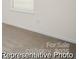 Bright bedroom featuring neutral carpet, ample natural light, and a window with blinds at 4044 Beacon Ave # 152, Monroe, NC 28110