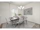 Elegant dining room with modern chandelier and stylish decor at 4044 Beacon Ave # 152, Monroe, NC 28110