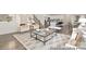 Comfortable living room with modern decor and lots of natural light from the open concept floor plan at 4044 Beacon Ave # 152, Monroe, NC 28110