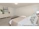 Inviting main bedroom with soft lighting, two windows, a queen sized bed, and elegant decor at 4044 Beacon Ave # 152, Monroe, NC 28110