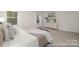 Inviting main bedroom with soft lighting, two windows, a queen sized bed, and elegant decor at 4044 Beacon Ave # 152, Monroe, NC 28110