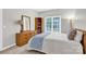 Comfortable bedroom with large window and ample natural light at 5015 Foxbriar Trl, Charlotte, NC 28269