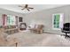 Spacious bonus room with neutral tones and ample seating at 5015 Foxbriar Trl, Charlotte, NC 28269