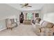 Large bonus room with carpet, windows, and plenty of natural light at 5015 Foxbriar Trl, Charlotte, NC 28269