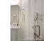 Elegant powder room with a pedestal sink, decorative mirror, and modern fixtures, adding a touch of sophistication at 6017 Santee River Way # 40, Belmont, NC 28012