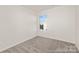 Inviting bedroom with natural light, soft carpeting, and neutral walls, creating a serene and comfortable space at 6017 Santee River Way # 40, Belmont, NC 28012