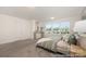 Comfortable main bedroom with soft carpeting, a cozy bed, and ample natural light, offering a serene atmosphere at 6017 Santee River Way # 40, Belmont, NC 28012