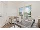 Well-lit office area featuring a stylish desk, comfortable seating, and a large window offering a pleasant view, ideal for productivity at 6017 Santee River Way # 40, Belmont, NC 28012