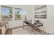 Bright office space with a modern desk, chair, decorative lamp, and soothing artwork, creating an inspiring workspace at 6017 Santee River Way # 40, Belmont, NC 28012