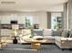 Inviting living room with a comfortable white sofa, open to the kitchen, and filled with natural light at 6406 Fairfax Ct, Maiden, NC 28650