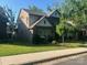 Charming brick home with lush green lawn and mature trees, located in a desirable neighborhood at 707 Marion Dr, Matthews, NC 28105