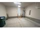View of a garage with a concrete floor and lots of space for storage at 707 Marion Dr, Matthews, NC 28105