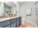 Elegant bathroom with double vanity, granite countertops, and modern fixtures at 902 Silverberry St, Gastonia, NC 28054