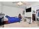 Cozy bedroom with ceiling fan and carpet flooring at 902 Silverberry St, Gastonia, NC 28054