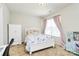 Charming bedroom with a cozy bed, playful decor, and plenty of natural light at 902 Silverberry St, Gastonia, NC 28054